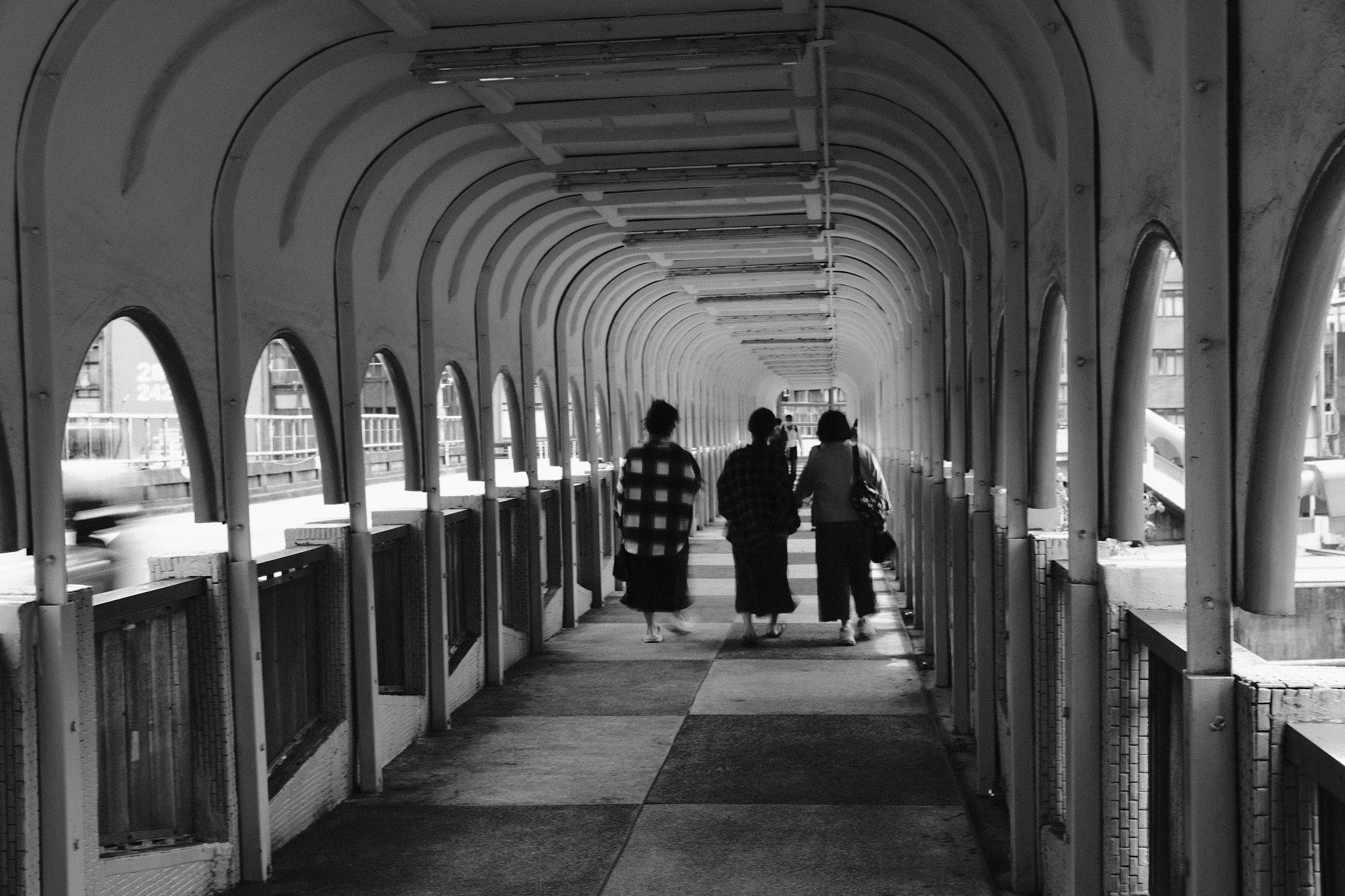 Busy intersection in Keelung with local signage and street movement