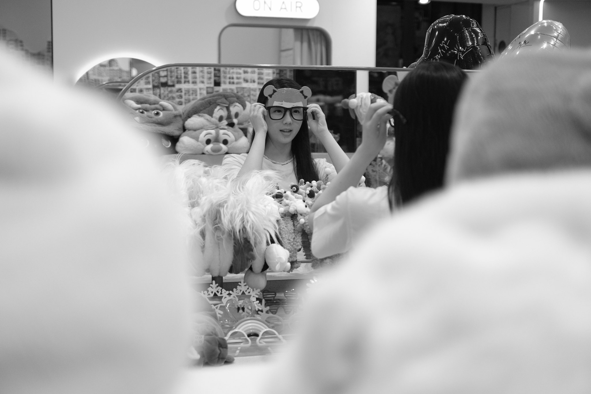 Busy pedestrian crossing in Ximending with colorful urban signage