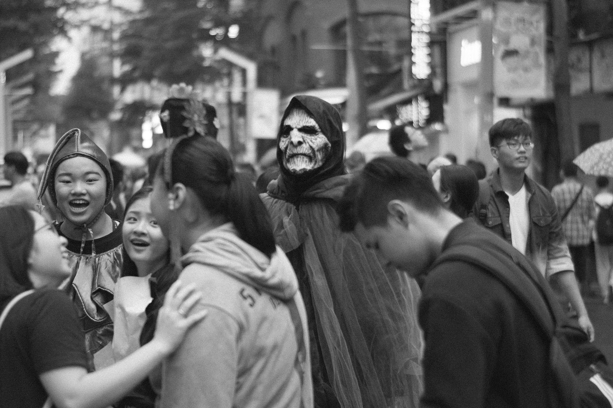 Busy evening in Ximending with crowds and glowing billboard lights