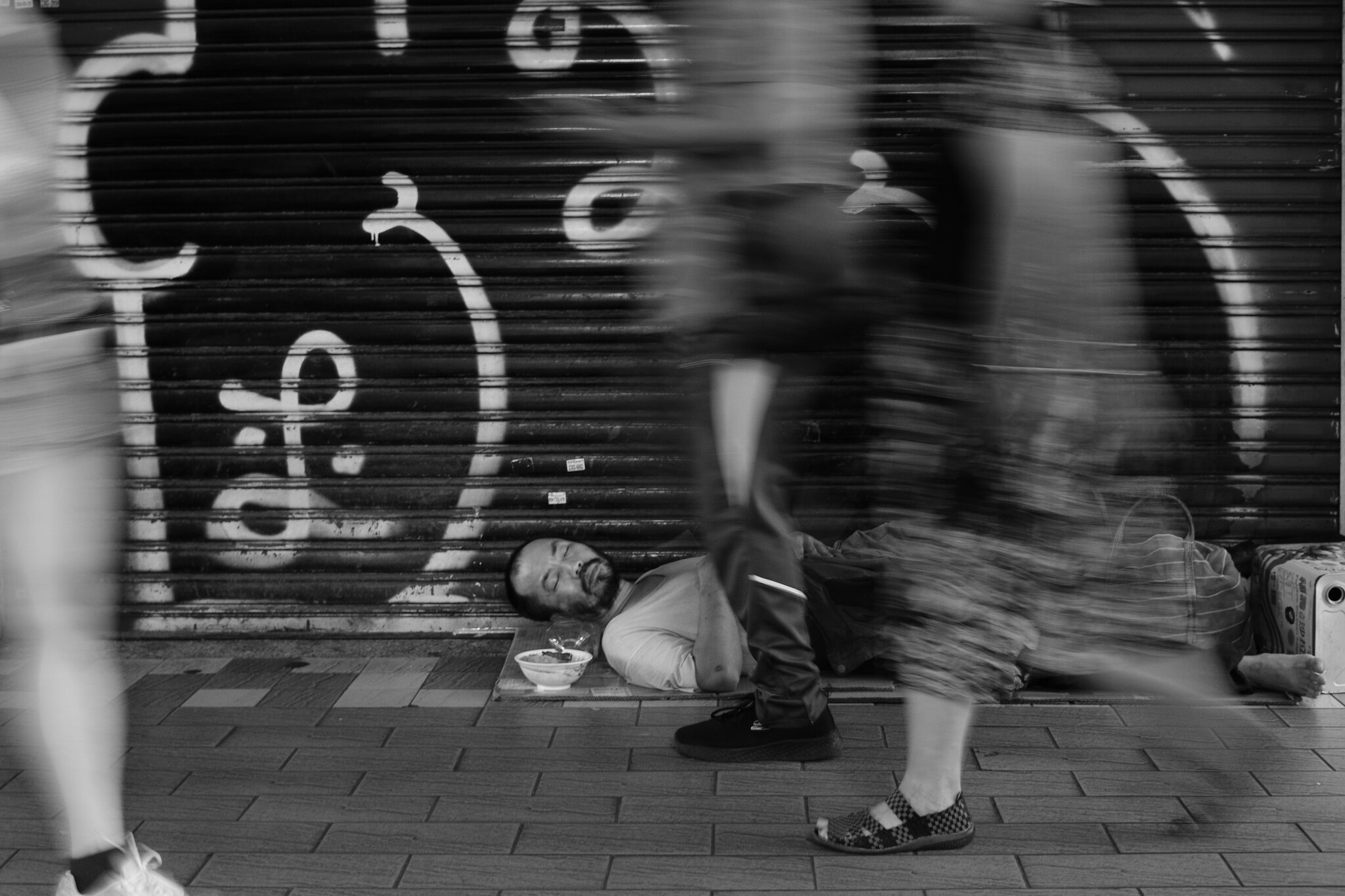 Cinematic street snap of a quiet corner in bustling Ximending