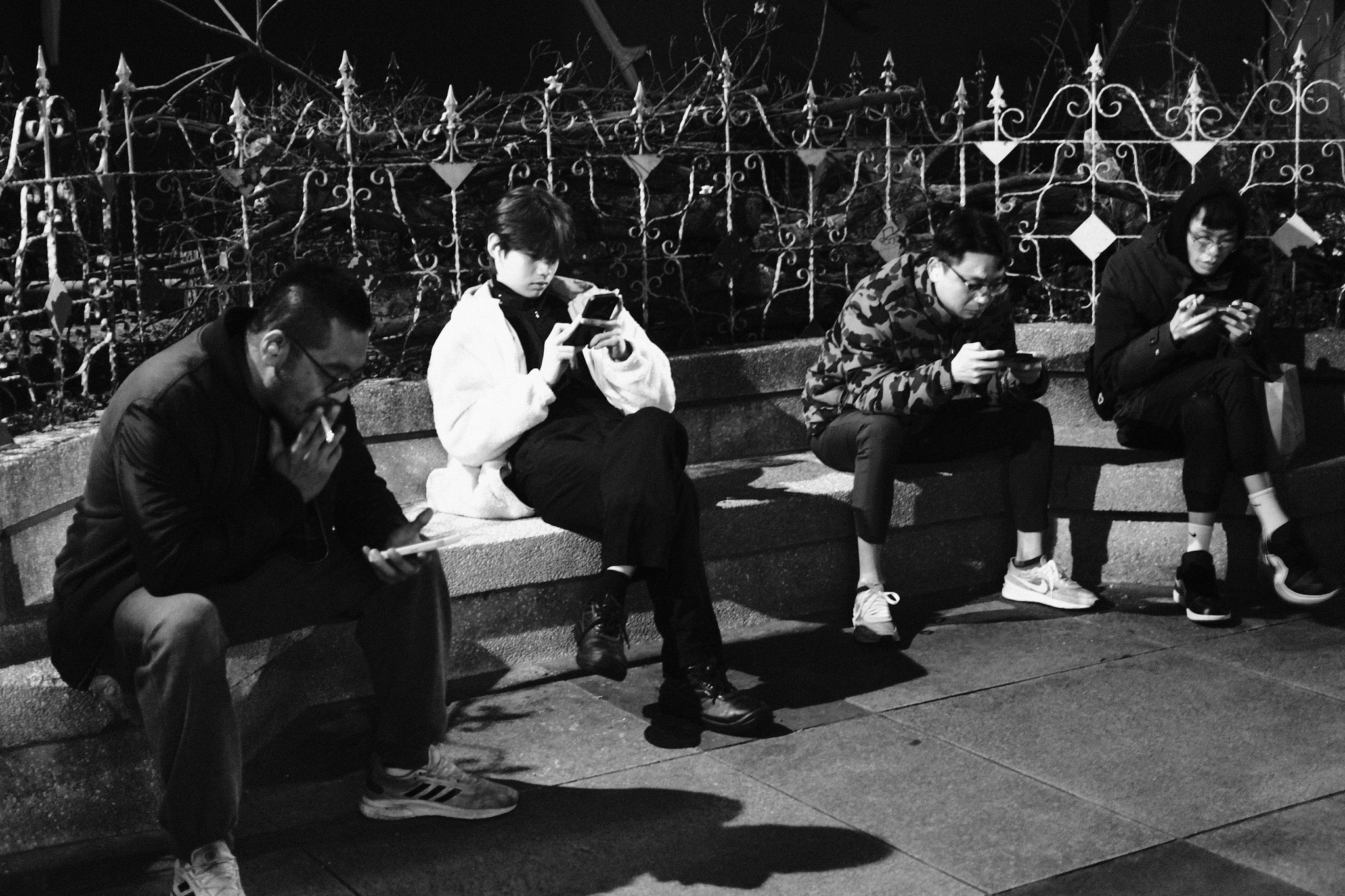 Dynamic street movement and light trails in Ximending at night