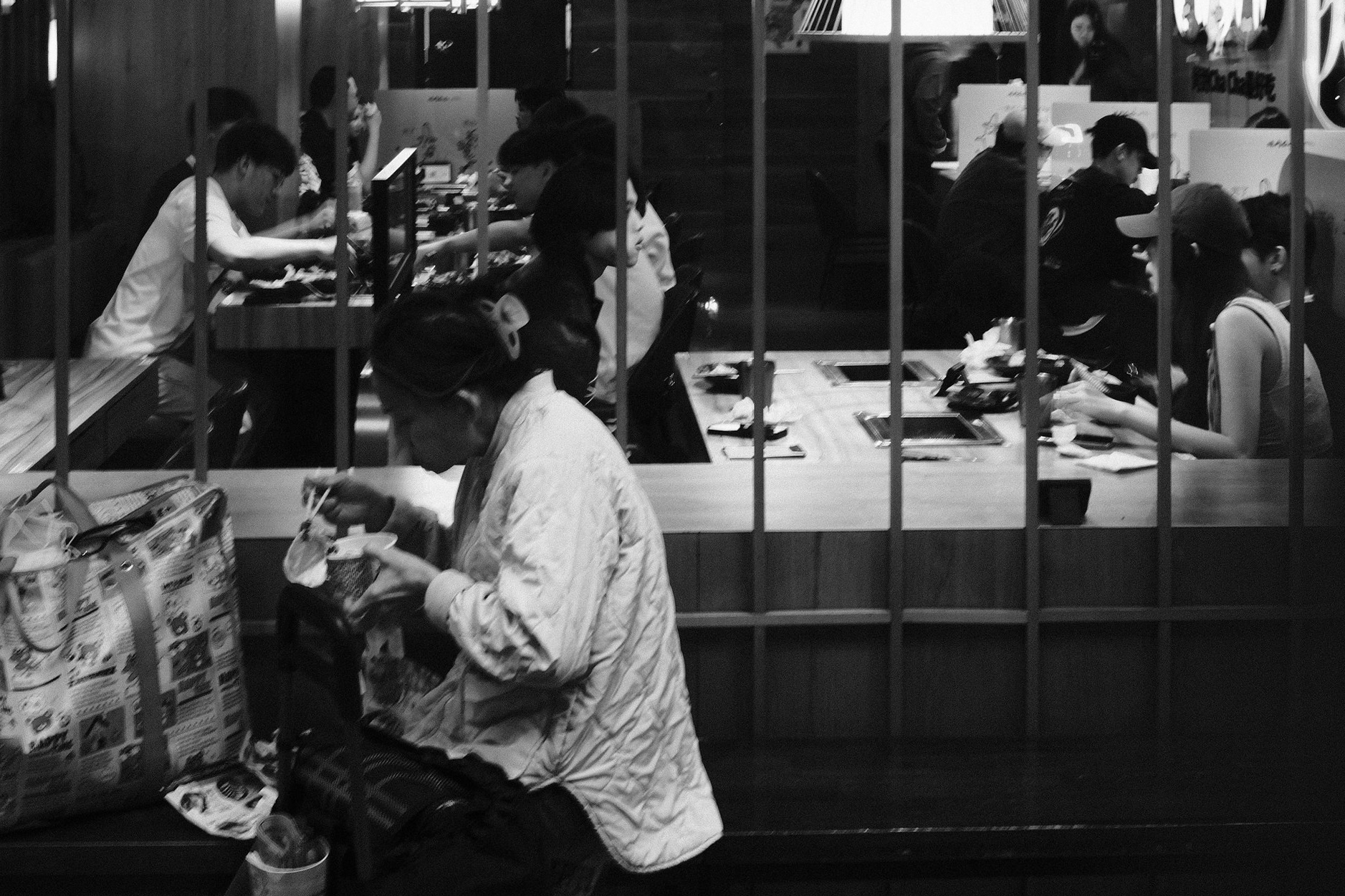 Reflections and patterns in the urban landscape of Ximending, Taipei